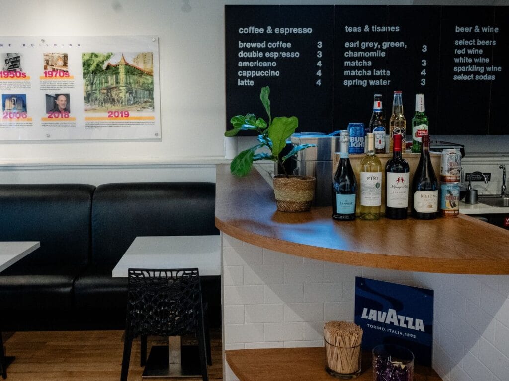 CityArts Cafe Interior with menu and wine