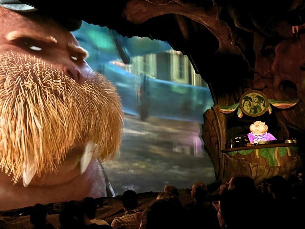 Disney adults Marsh Market Scene with Clawhauser Animatronic Zootopia Better Zoogether at Animal Kingdom  - image by Dani Meyering