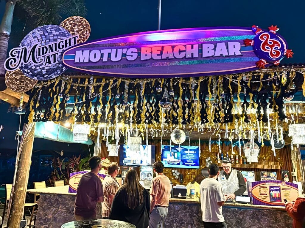 Midnight at Motu’s Bar at ILLUMINATE Aquatica Orlando - image by Dani Meyering