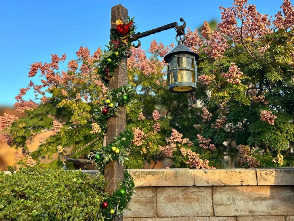 New Christmas Decorations at Magic Kingdom Village Square Fantasyland - image by Dani Meyering