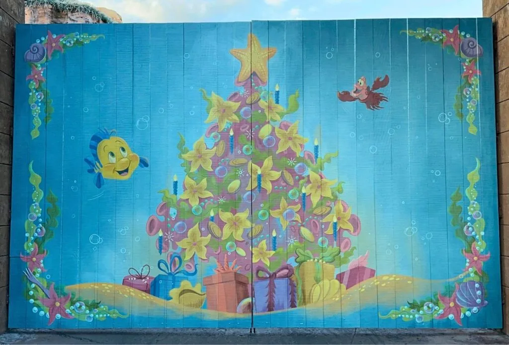 New Christmas Mural with Sebastian and Flounder of The Little Mermaid at Magic Kingdom - image by Dani Meyering