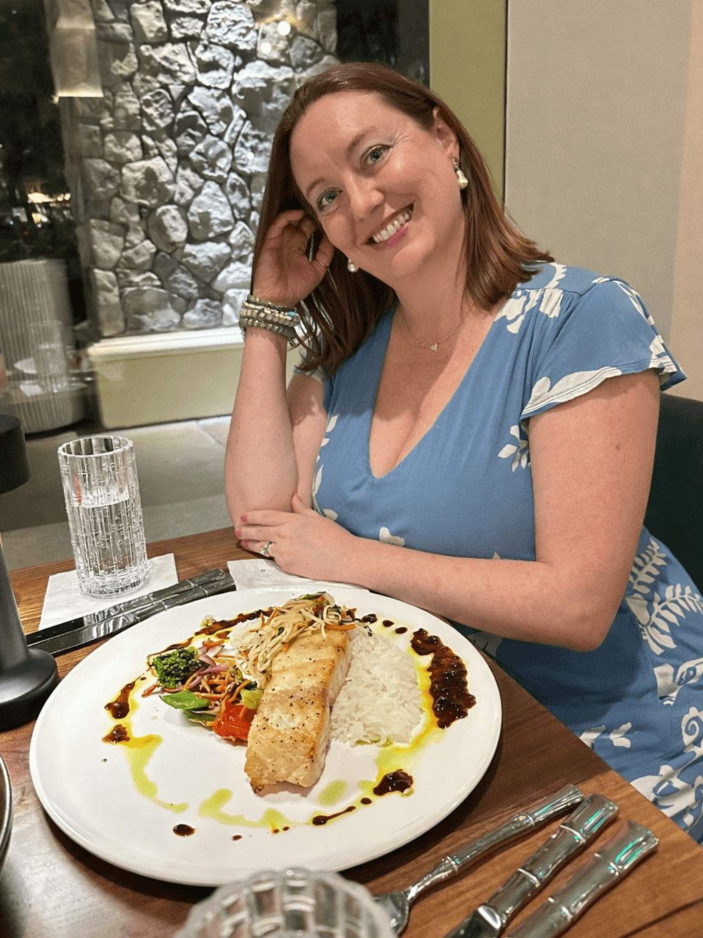 Dani Meyering posing with entree at Islands Dining Room Loews Royal Pacific Resort at Universal Orlando