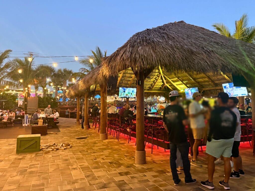 Outdoor Tiki Bar Dirty Birds Bar and Grill Cocoa Beach evening - image by Jodi Caballero