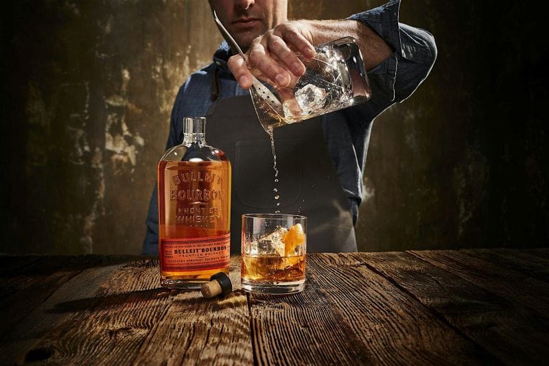 bartender pouring Bulleit Whiskey at The Whiskey's Bulleit Tasting in Orlando