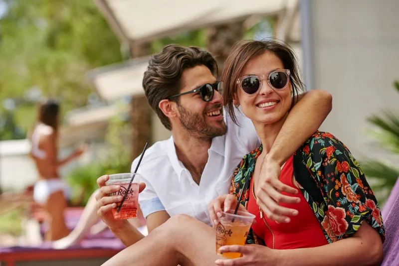 A couple enjoying the beach at Hard Rock Hotel Daytona Beach